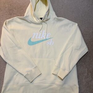 Nike Cream Hoodie with Blue Logo